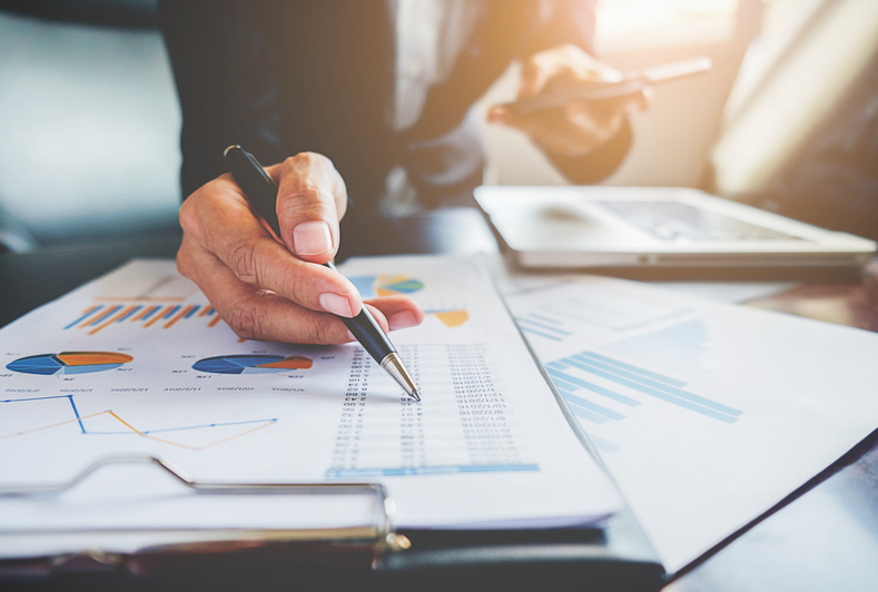 Accounting professional preparing financial reports for UAE company registration and compliance